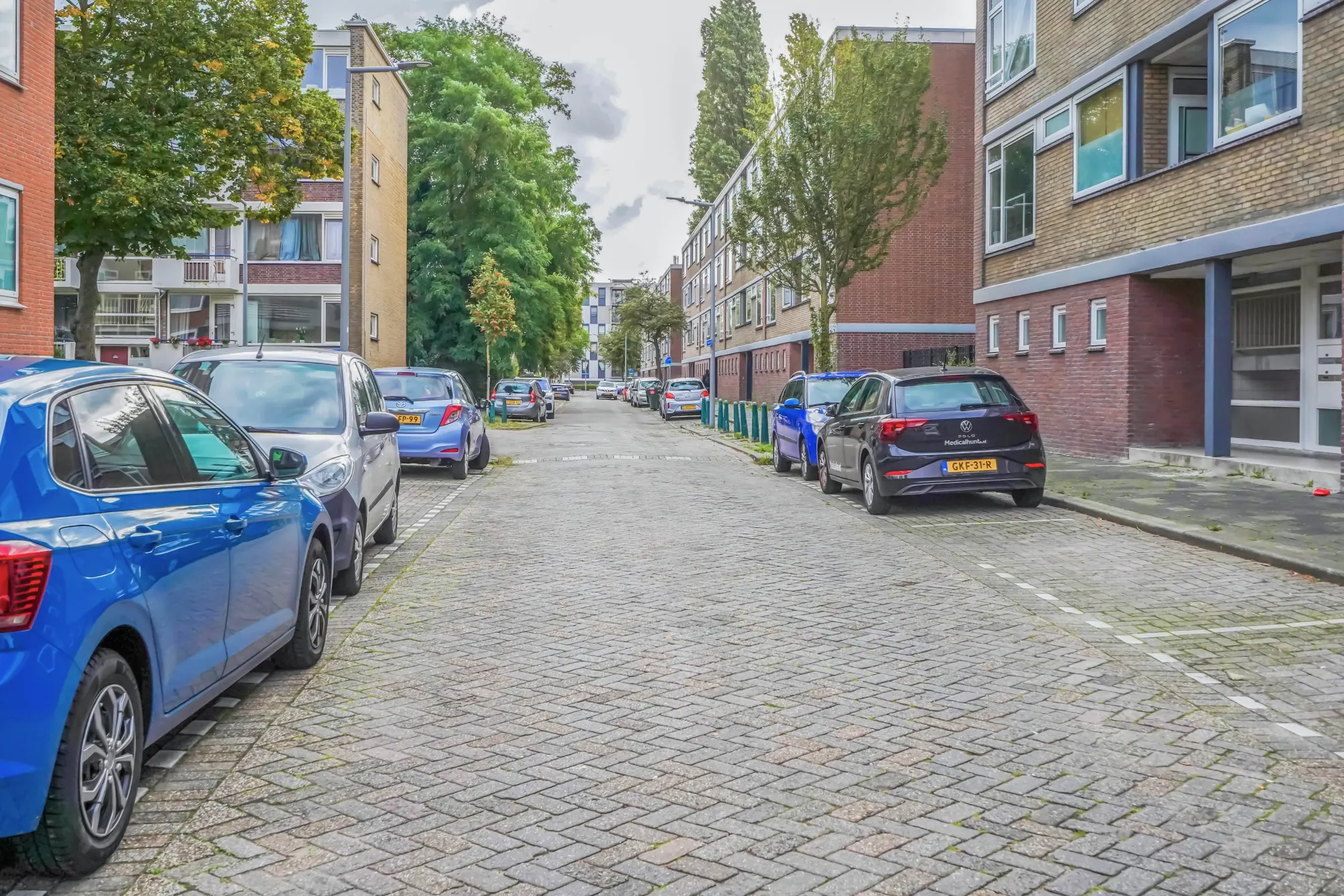 Tholenstraat 114, Rotterdam — street view with parking